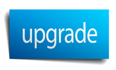 upgrade blue paper sign isolated on white
