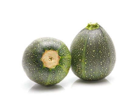 round zucchinis (Cucurbita pepo)isolated on white background