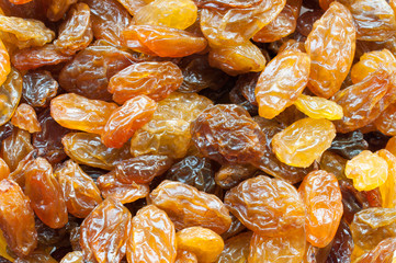 Yellow sultanas raisins background