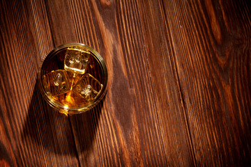 Glass of whiskey with ice