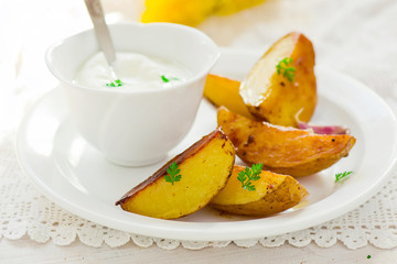 Segments of baked potato
