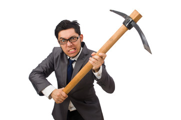 Young businessman holding a tool isolated on white