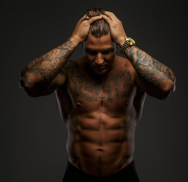 Muscular man with tattooes