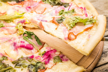 Pick up slice of pizza