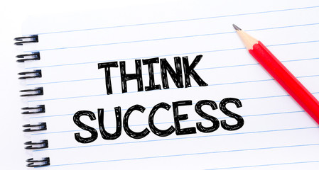 THINK SUCCESS Text written on notebook page