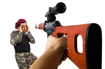 Soldier with a weapon isolated on white