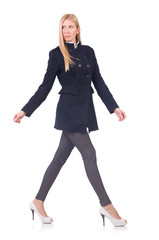 Fototapeta premium Woman in dark coat isolated on white