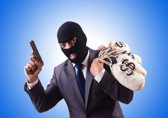 Gangster with bags of money on white