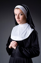 Young nun in religious concept