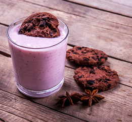 biscuits with yogurt on a wooden background