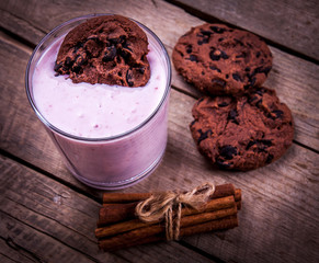 biscuits with yogurt on a wooden background