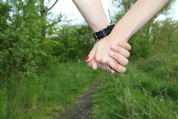 Lovers hands together