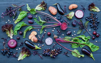 Collection of fresh purple fruit and vegetables
