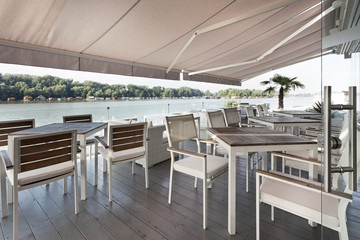 Modern riverside terrace cafe