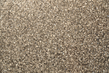 Defocused glitter - abstract sparkly background.