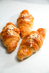 almond croissant on a white background.