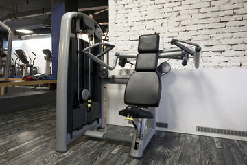Chest press machine in gym
