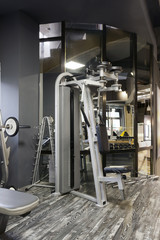Modern gym interior with equipment 