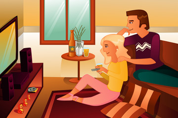 Couple watching TV  at home