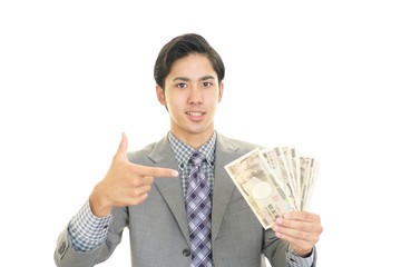 札束を持つ男性