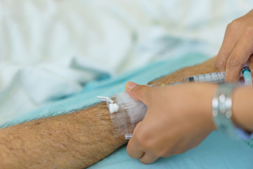 Arm of a man patient in the hospital