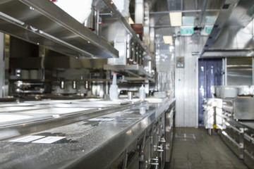 Fototapeta premium Professional kitchen , view counter in steel . Bokeh .