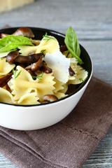Farfalle pasta with mushrooms in a bowl