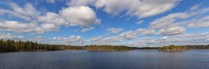clouds over the forest lake