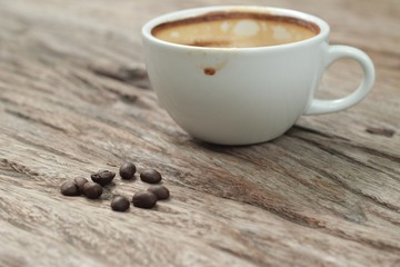 Vintage latte art coffee in cup