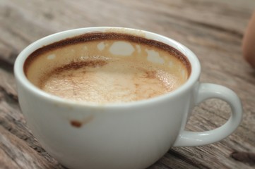 Vintage latte art coffee in cup
