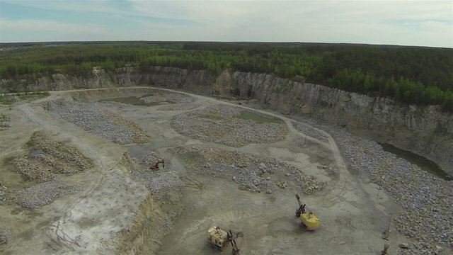 Fly over  pit on production of  stone with excavators. Aerial  