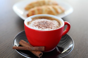 Italian cappuccino and croissant