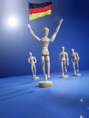 Sieg mit Holzpuppen symbolisch dargestellt