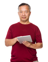 Asian man use of digital tablet