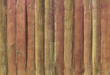 Texture fence red brown and green weathered