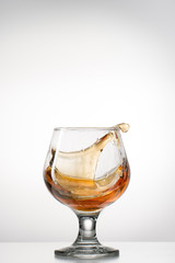 Cognac glass with splash