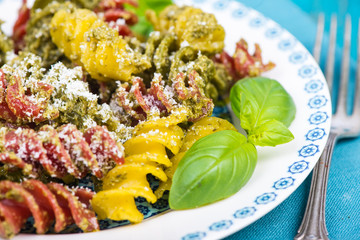 Homemade fresh pest with pasta with grated parmesan