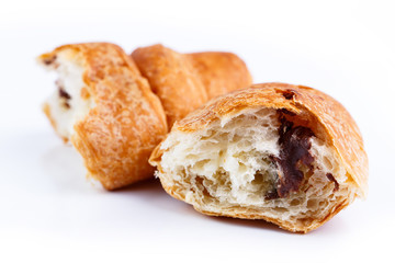 Tasty croissant on a white background.