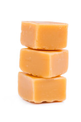 Tasty toffees on a white background.