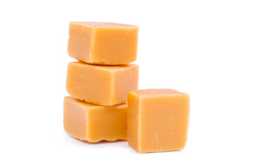 Tasty toffees on a white background.
