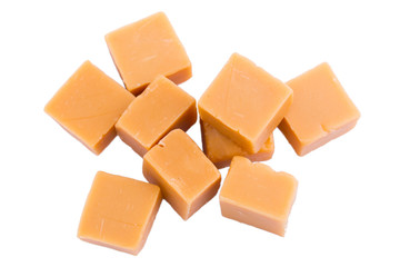Tasty toffees on a white background.