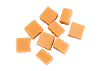 Tasty toffees on a white background.