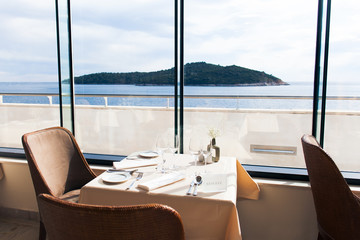 Fototapeta na wymiar empty restaurant interior with sea view