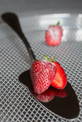 Strawberry on a metal blade cooking