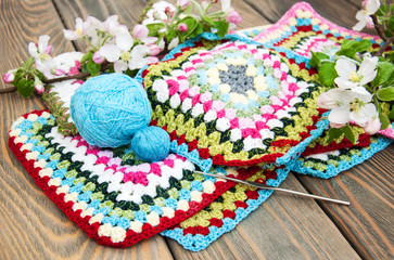 multicolored plaid squares of crocheted