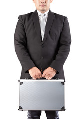 young business man holding strong metal briefcase in hand isolat