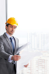 businessman in construction helmet
