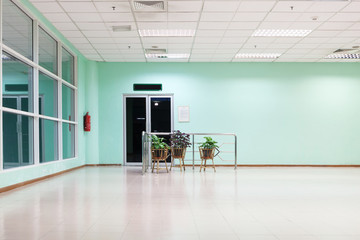 empty long corridor in the modern office building.