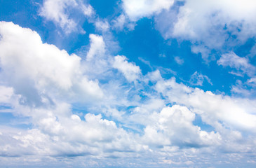 Naklejka na ściany i meble Blue sky with clouds in sunny day