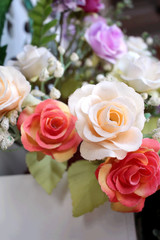 Obraz na płótnie Canvas Beautiful vintage roses of artificial flowers